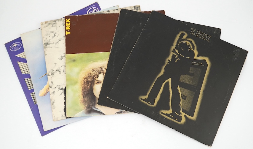 Six T. Rex LP record albums; Electric Warrior on Fly HIFLY6 with inner sleeve and non-stickered cover and another (both missing poster), T.Rex HIFLY2 in semi gate fold cover, The Slider, Futuristic Dragon, Ride a White S